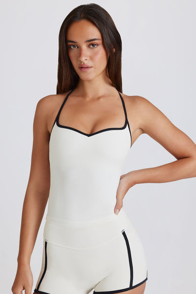 Top Soft Active cruzado en la espalda color marfil