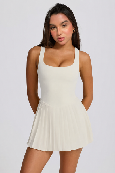Vestido de tenis plisado con espalda descubierta y suave, color malvavisco