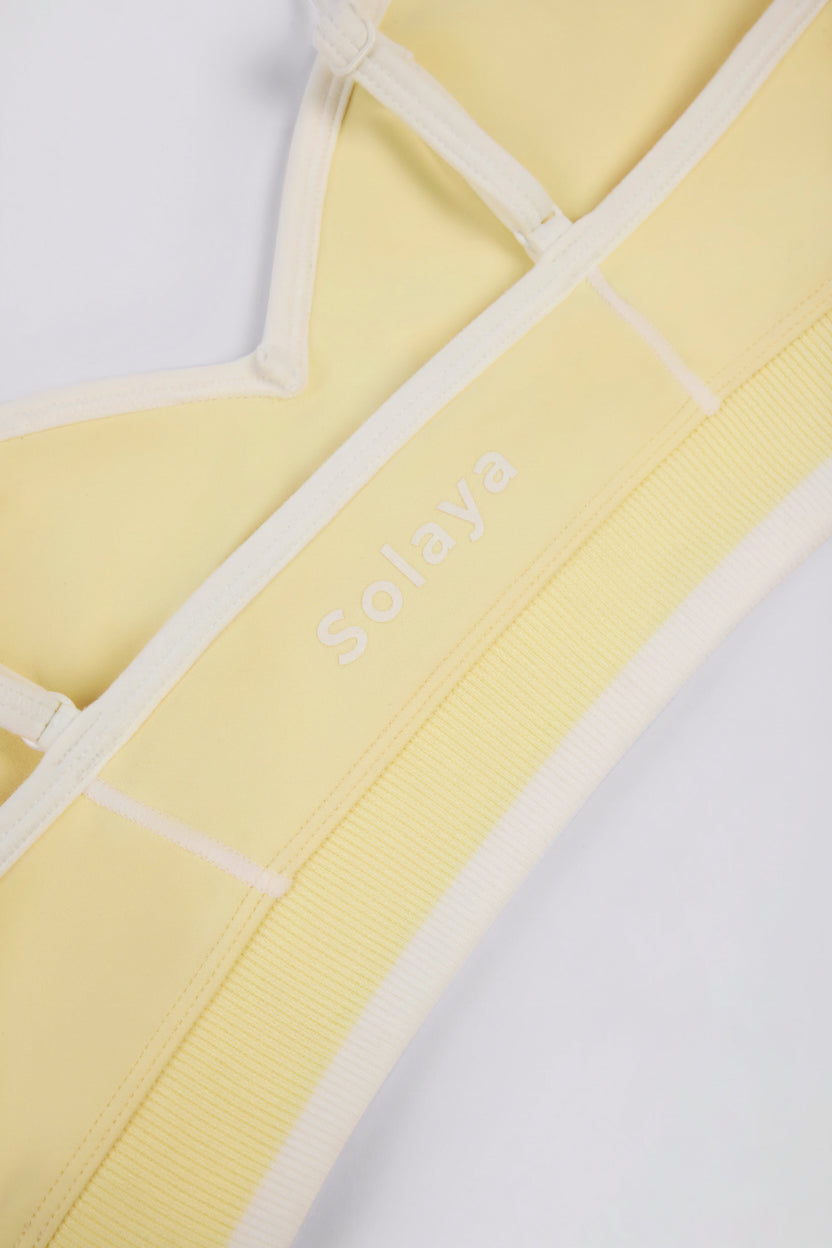 Brasier deportivo Soft Active con escote corazón y contraste en limón