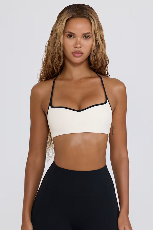 Brasier deportivo Soft Active con escote corazón en color blanco