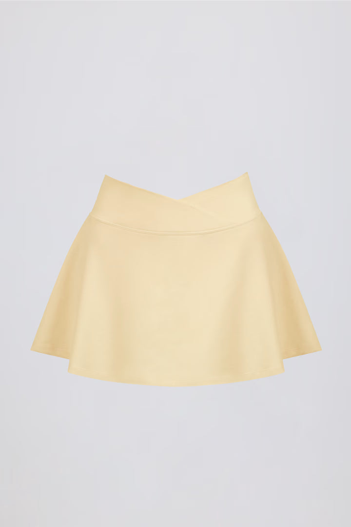 Minifalda pantalón cruzada de jersey cepillado en color limón jaspeado