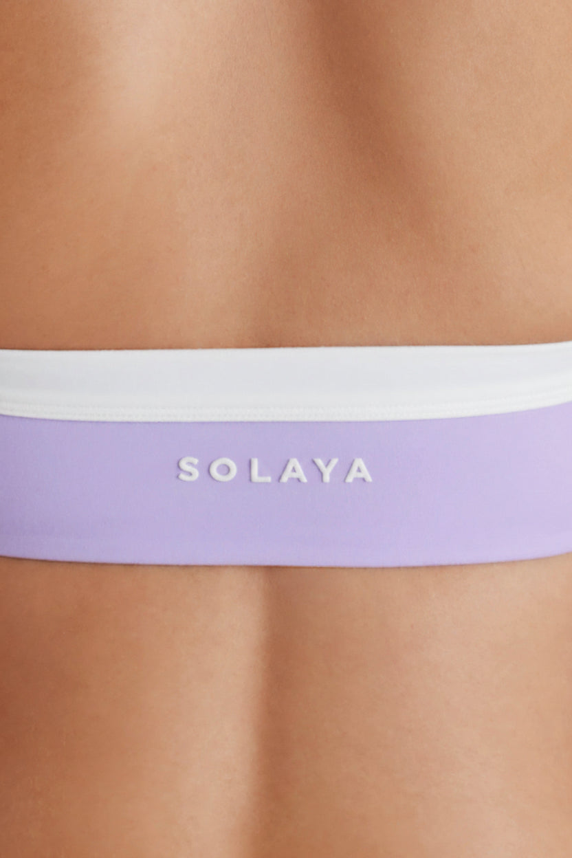 Brasier deportivo Soft Active tipo halter con torcido al frente en lavanda