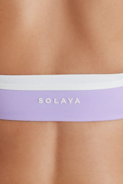 Brasier deportivo Soft Active tipo halter con torcido al frente en lavanda