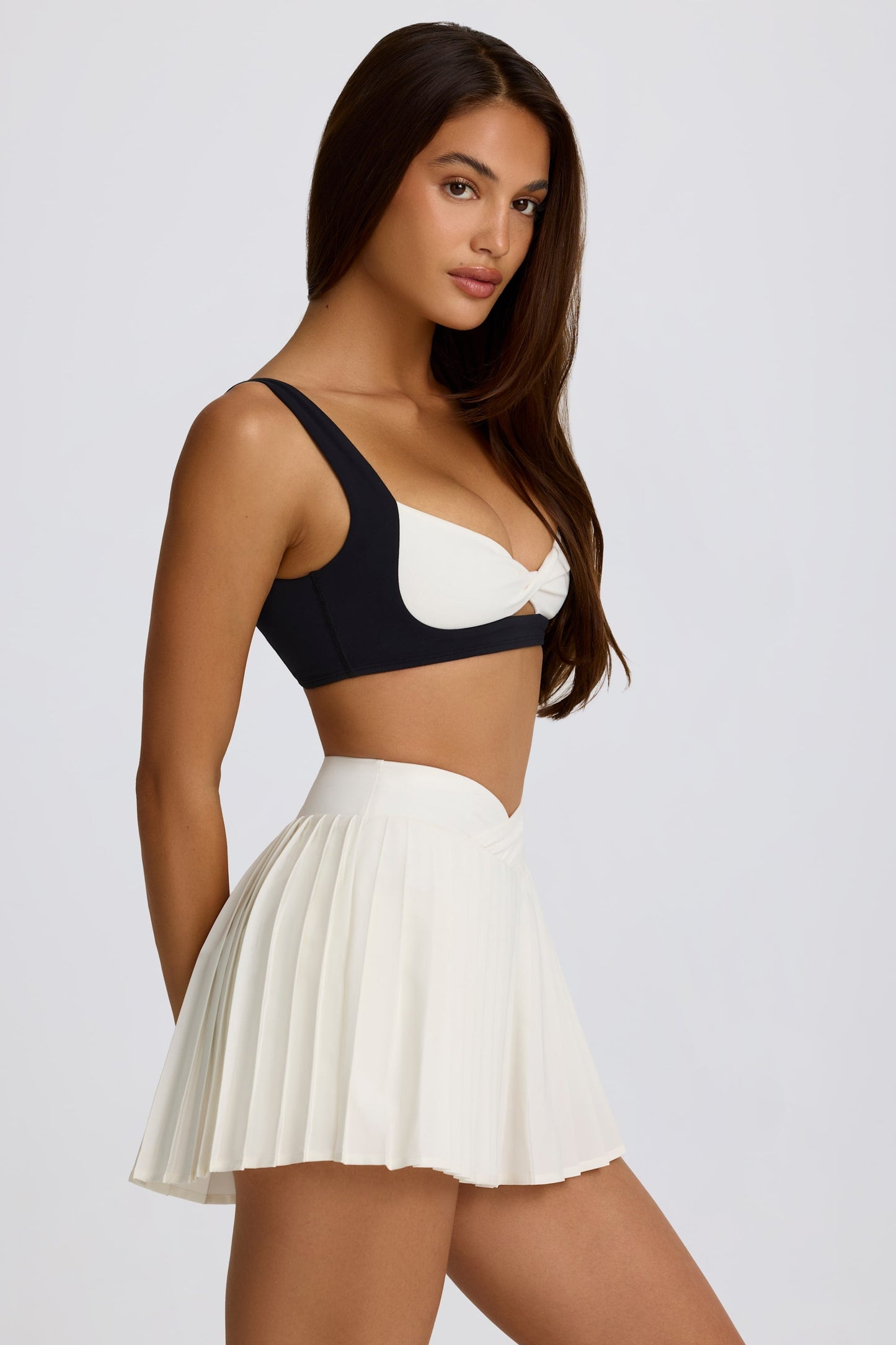 Minifalda pantalón cruzada plisada Soft Active en malvavisco