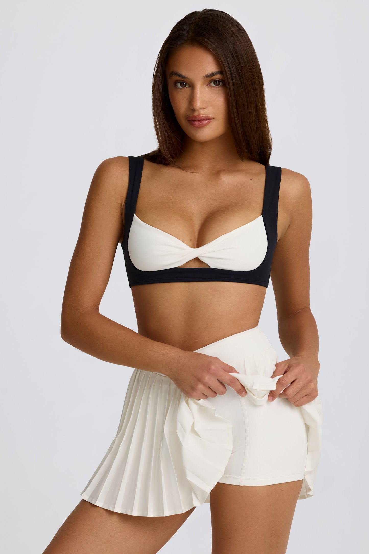 Minifalda pantalón cruzada plisada Soft Active en malvavisco