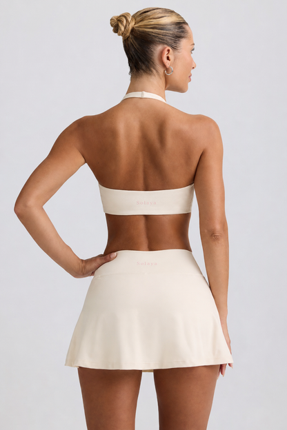 Minifalda pantalón cruzada de jersey cepillado en vainilla