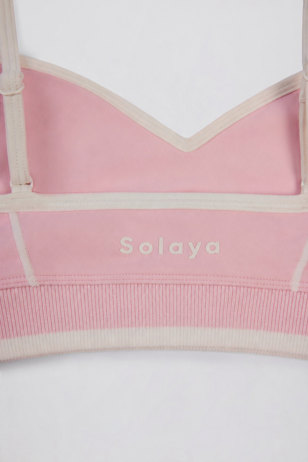 Brasier deportivo Soft Active con escote corazón y contraste en rosa palo