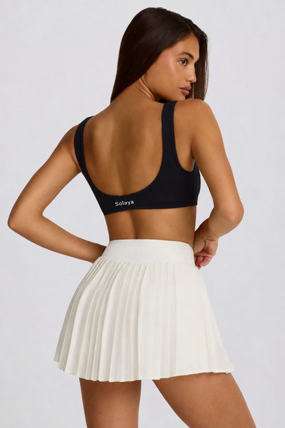 Minifalda pantalón cruzada plisada Soft Active en malvavisco
