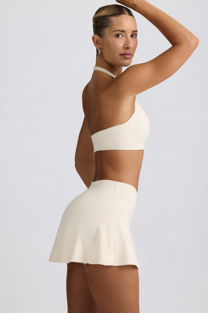 Minifalda pantalón cruzada de jersey cepillado en vainilla